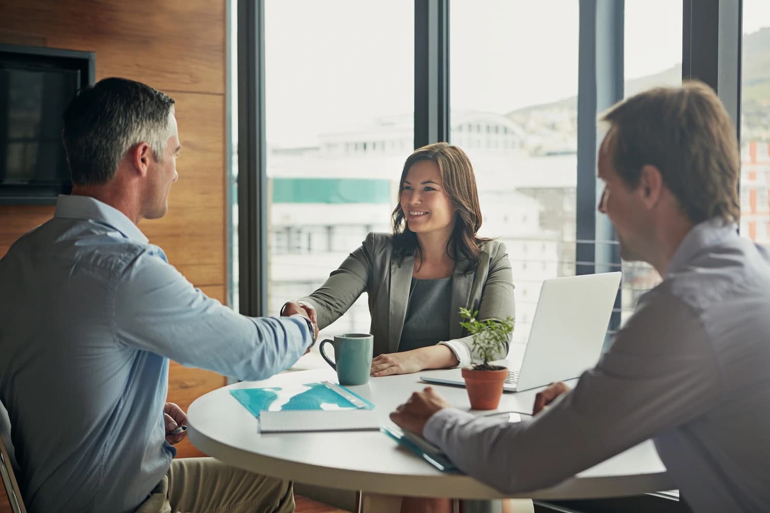 Business meeting to discuss customized fleet management solutions